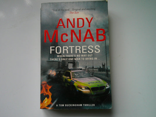 Andy McNab The Fortress book featuring a thrilling Tom Buckingham storyline and police imagery